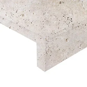 Ivory travertine drop face pool coping
